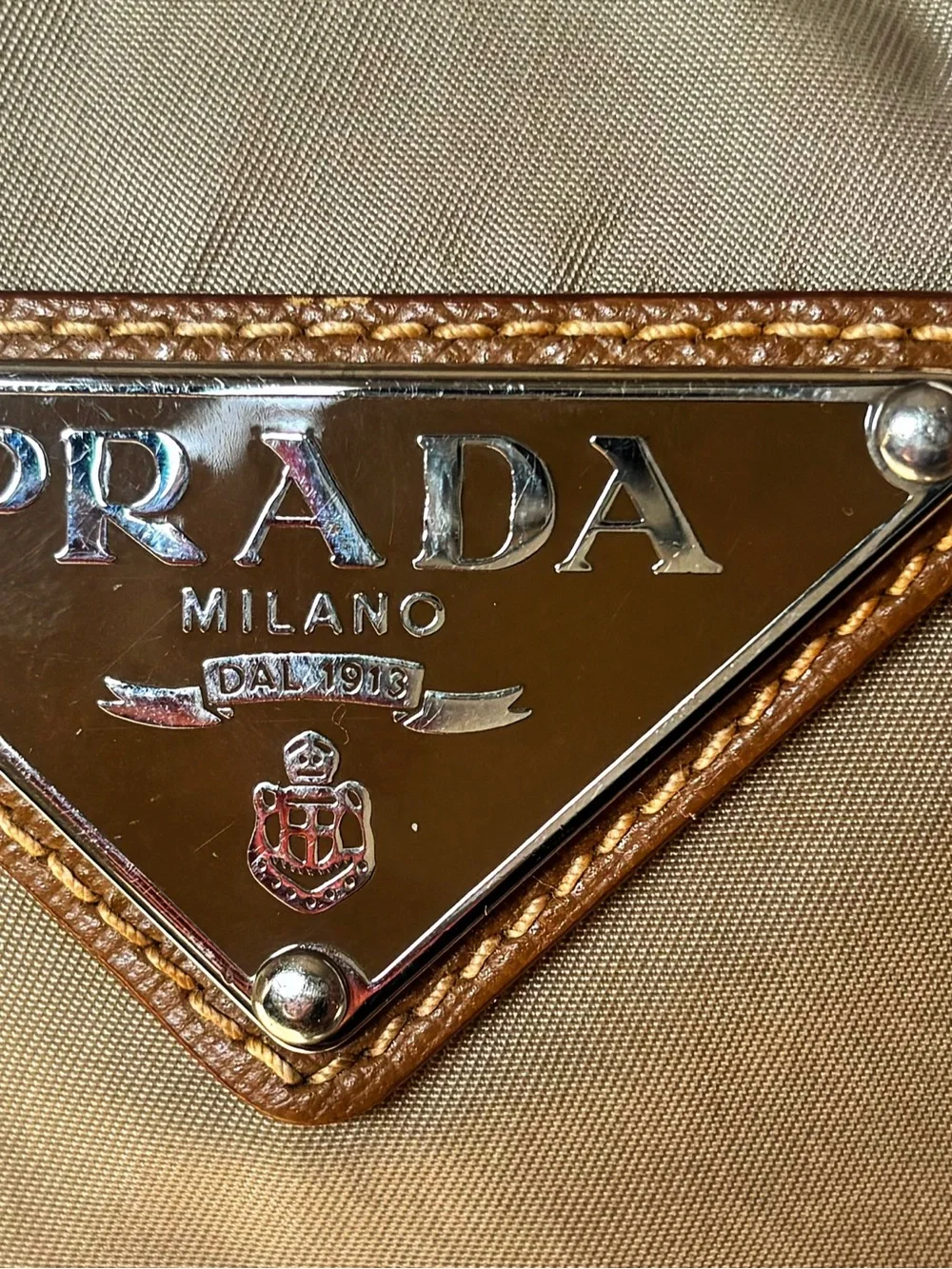 Vintage Prada Tessuto hobo bag crafted from beige/khaki nylon with leather strap